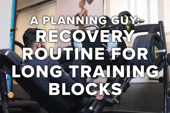 Athlete reviewing a training plan and recovery schedule for a multi-week block