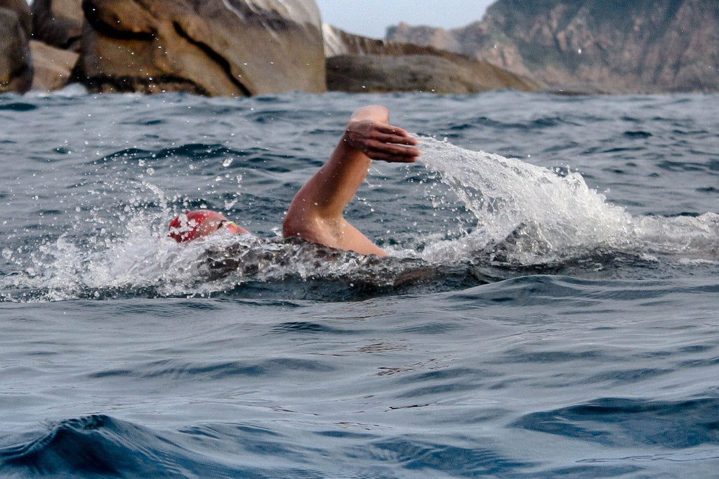 CBD and Kinesiology tape for swimmers and triathletes made by CannaTape Sport, A natural water resistant inflammation fighter and pain relief solution leveraging CBD and Menthol is the best way to help ease pain and relieve soreness safely 